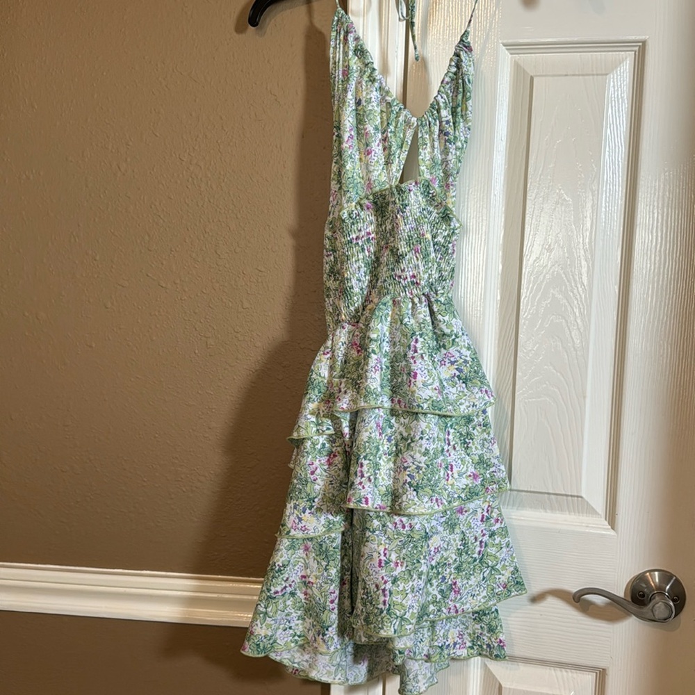 Size 4. Floral dress. Open back. Halter dress. Good condition.